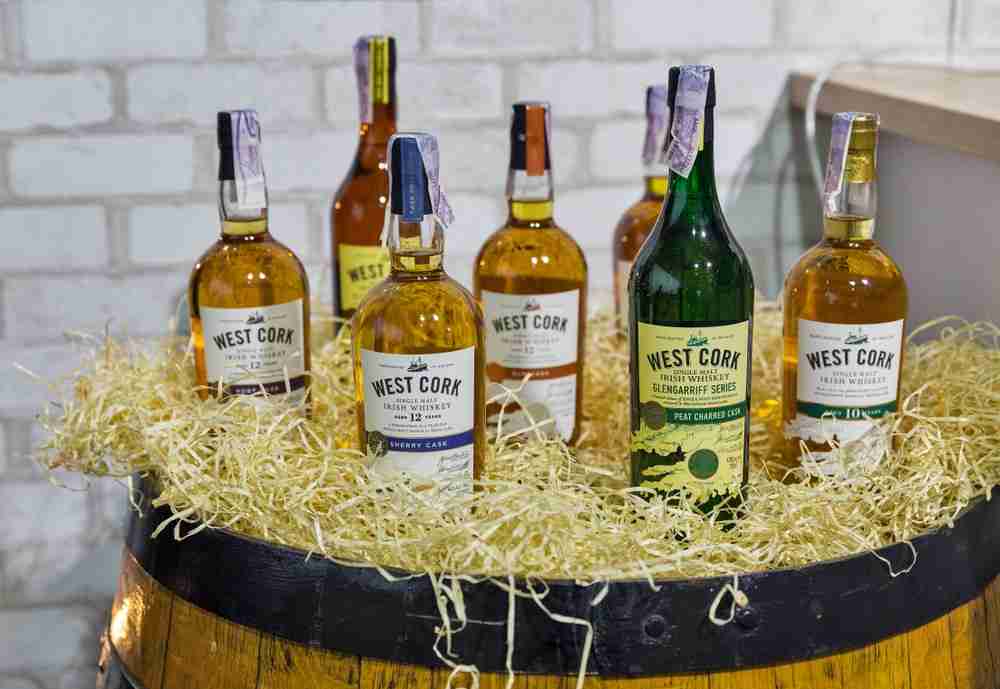 Display of 7 bottles of West Cork Whiskey