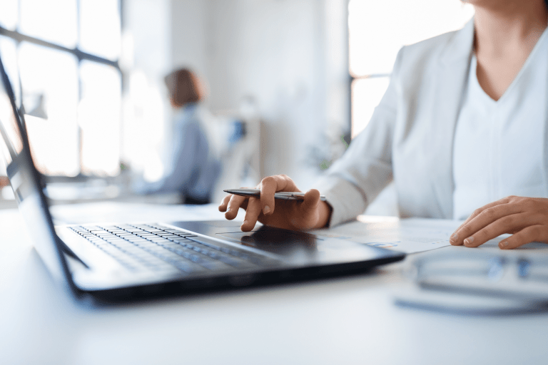 Female at a laptop keyboard