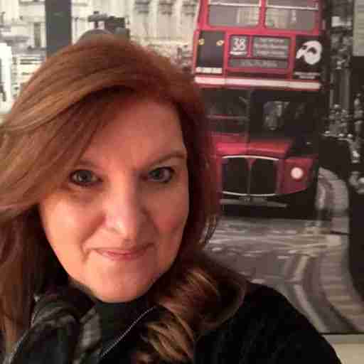 Woman named Konnie and a London double-decker bus in the background