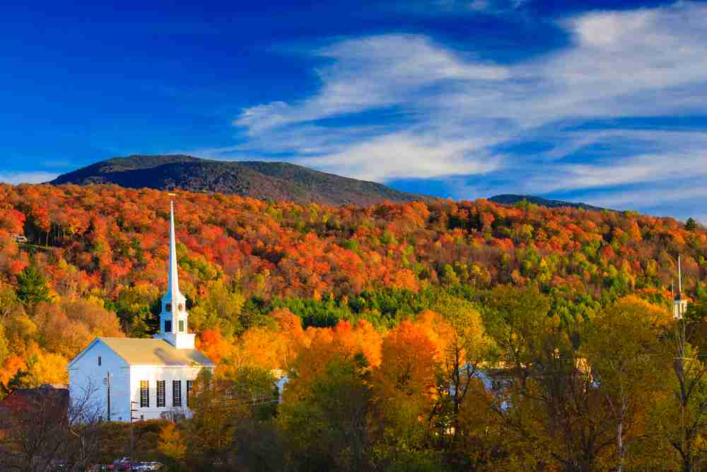 Fall in Stowe Vermont - typical New England white church steeple in the corner