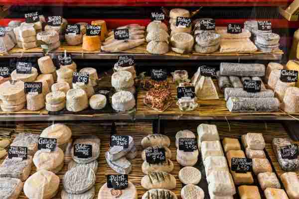 Selections of cheeses for sale - Premier Photo/Shutterstock.com