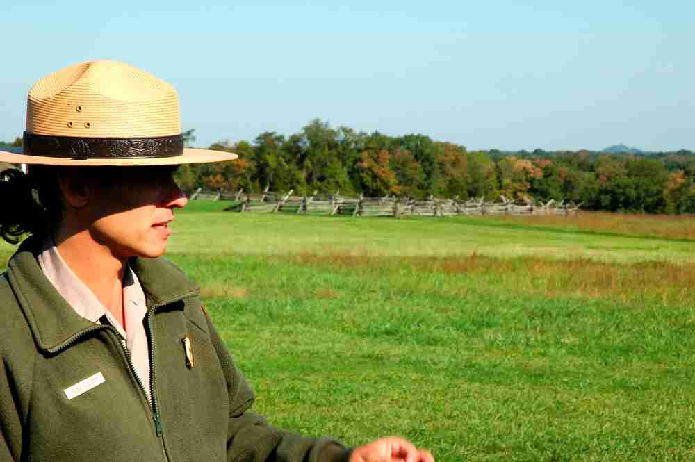 A National Parks Ranger overlooking a part of Manassas National Battlefield Park
