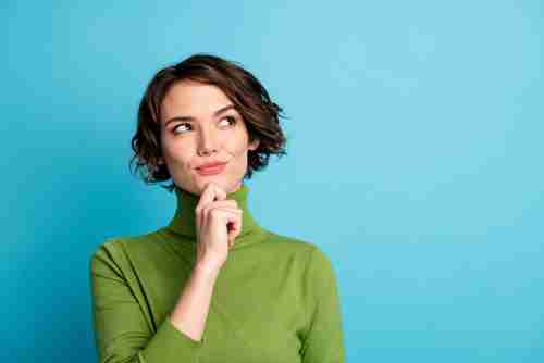 Woman looking up and to the right - thinking or guessing something